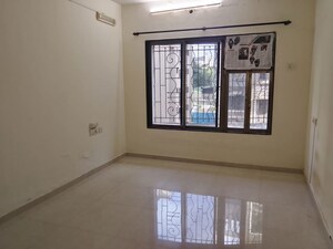 Room in 2 BHK Apartment at Serenity Complex, Andheri West – for Rent
