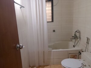 Bathroom in 2 BHK Apartment at Serenity Complex, Andheri West – for Rent