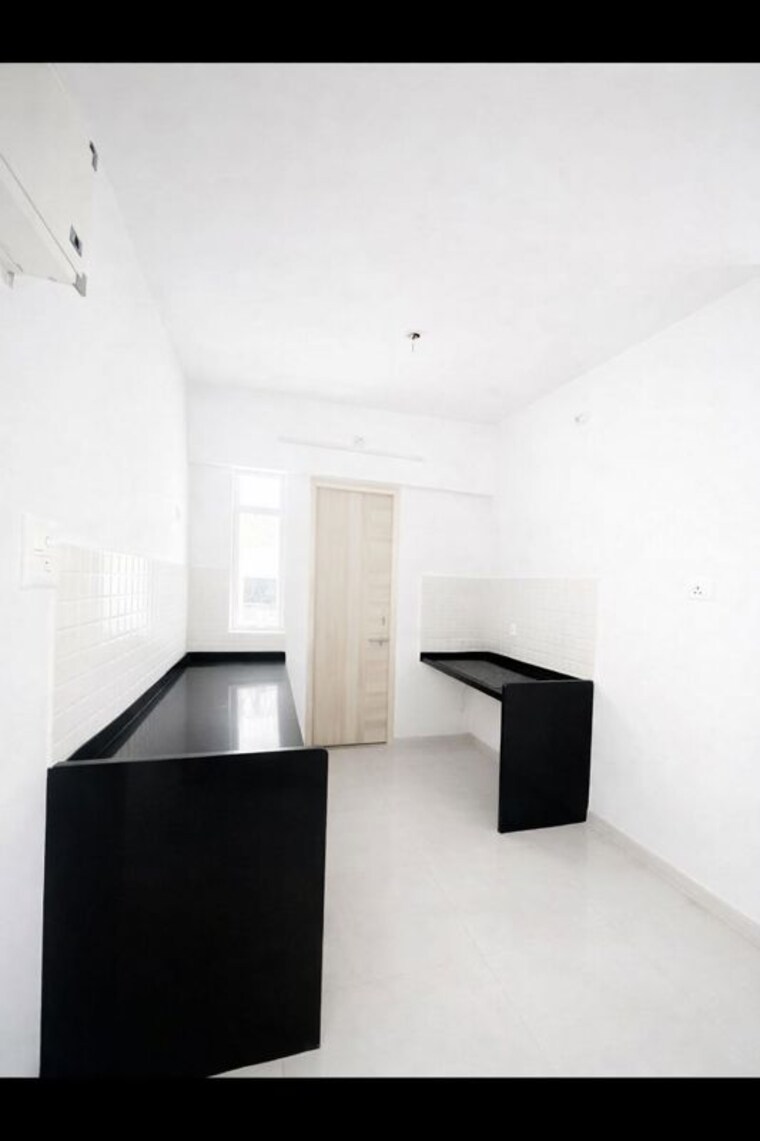 Kitchen, atul-pari-towers 2 Bedroom 800 Sq.Ft. Apartment In Narhe Pune 10628891