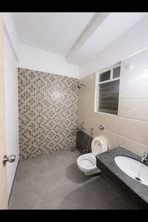 Bathroom in 2 BHK Apartment at Atul Pari Towers, Narhe – for Sale