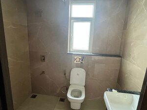 Bathroom in 2.5 BHK Apartment at Smart World Orchard, Sector 61 – for Rent