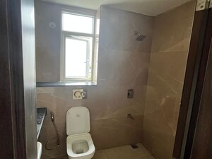Bathroom in 2.5 BHK Apartment at Smart World Orchard, Sector 61 – for Rent
