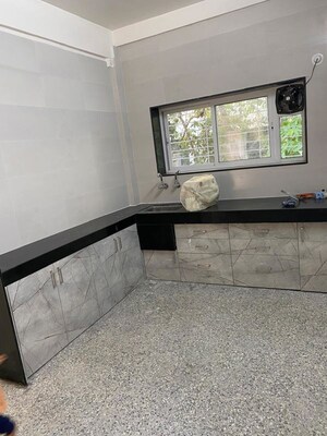 Kitchen in 2.5 BHK Apartment at Shri Senapati Bapat CHS, Senapati Bapat Road – for Rent