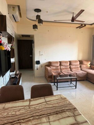 Living Room in 2 BHK Apartment at Lodha Amara, Kolshet Road – for Sale