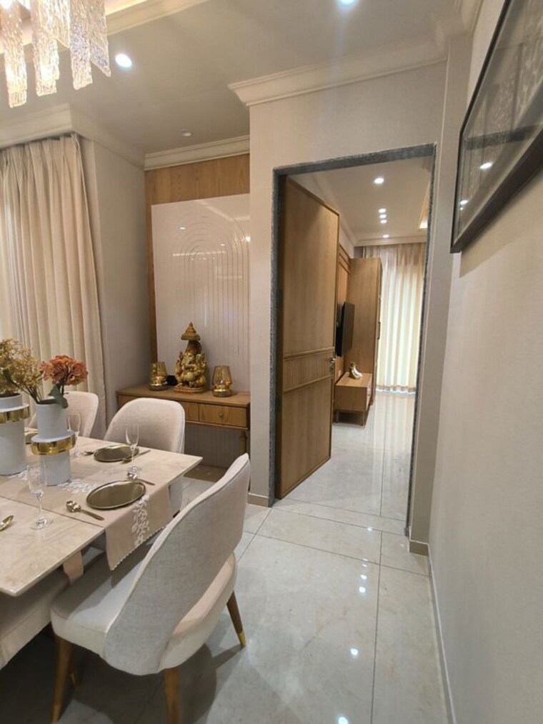 Dining area, courtyard-tiara 4 Bedroom 2706 Sq.Ft. Apartment In Bhayli Vadodara 10628960