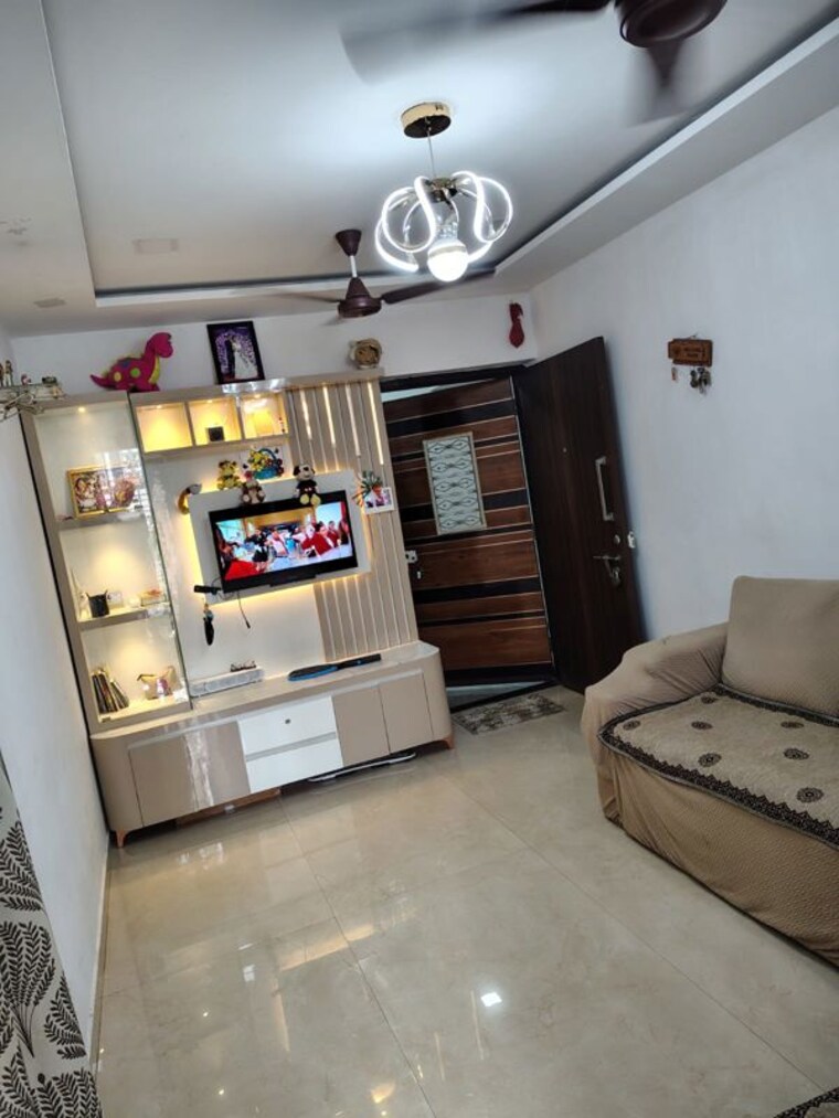 Living Room, rna-ng-ocean-pearl 1 Bedroom 400 Sq.Ft. Apartment In Mira Road Thane 10629053