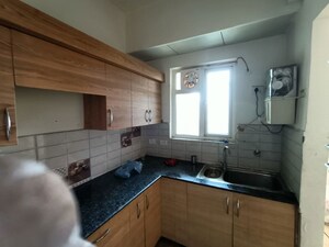 Kitchen in 2 BHK Apartment at Gaur City 2 - 14th Avenue, Sector 16c Greater Noida – for Rent