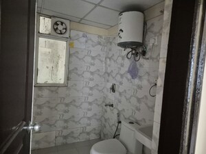 Bathroom in 2 BHK Apartment at Sethi Max Royale, Sector 76 – for Rent