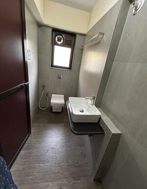 Bathroom in 3 BHK Apartment at Aashna Kamal Dutt CHS, Amboli – for Rent