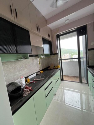 Kitchen in 1 BHK Apartment at Dhamji Shamji Mahavir Spring Tulip Phase 1, Pokhran Road No Two – for Rent