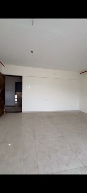 Living Room in 2 BHK Apartment at Bhagwati Belmont, Haware City – for Sale