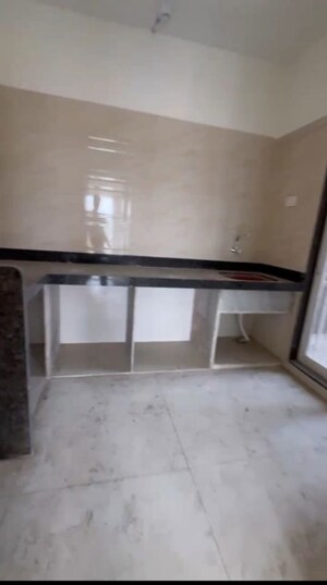 Kitchen in 2 BHK Apartment at Bhagwati Belmont, Haware City – for Sale