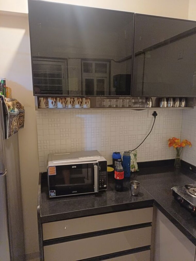 Kitchen, basil-mondale 2 Bedroom 713 Sq.Ft. Apartment In Mundhwa Pune 10629374