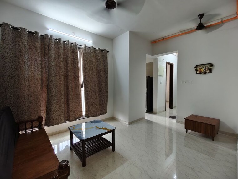 Living Room, empire-meghna 2 Bedroom 609 Sq.Ft. Apartment In Borivali West Mumbai 10629405