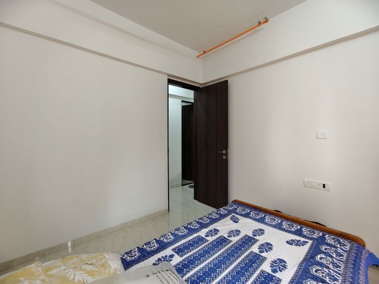 Bedroom, empire-meghna 2 Bedroom 609 Sq.Ft. Apartment In Borivali West Mumbai 10629405