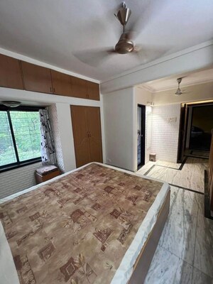 Bedroom in 2 BHK Apartment at Eden Woods complex, Manpada – for Rent