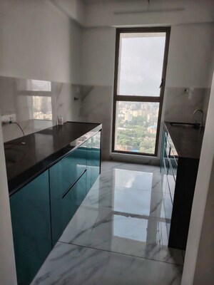 Kitchen in 1 BHK Apartment at Raymond The Address, Pokhran Road No Two – for Rent