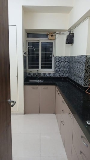 Kitchen in 3.5 BHK Apartment at T Bhimjyani Neelkanth Woods Olivia, Ghodbunder Road – for Rent