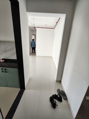 Building Lobby in 2 BHK Apartment at Naman Habitat, Andheri West – for Rent