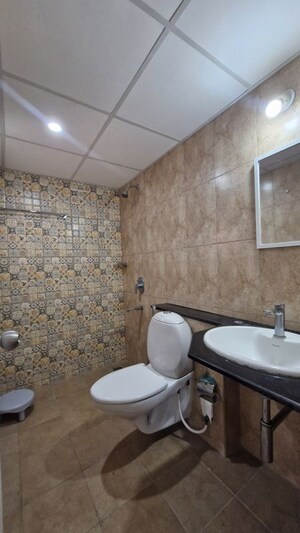 Bathroom in 1 BHK Apartment at Brigade Bricklane, Jakkuru – for Rent