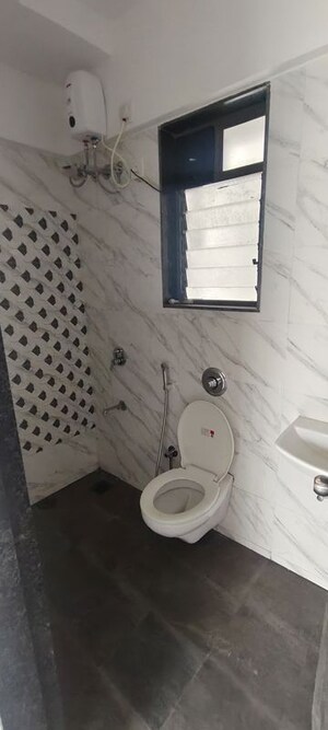 Bathroom in 1 BHK Apartment at UK Iridium, Kandivali East – for Rent