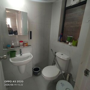 Bathroom in 2 BHK Apartment at Runwal Gardens, Dombivli East – for Rent