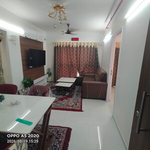Living Room in 2 BHK Apartment at Runwal Gardens, Dombivli East – for Rent