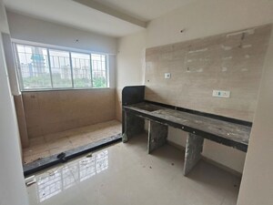Kitchen in 1 BHK Apartment at F5 Felicia, Hadapsar – for Sale