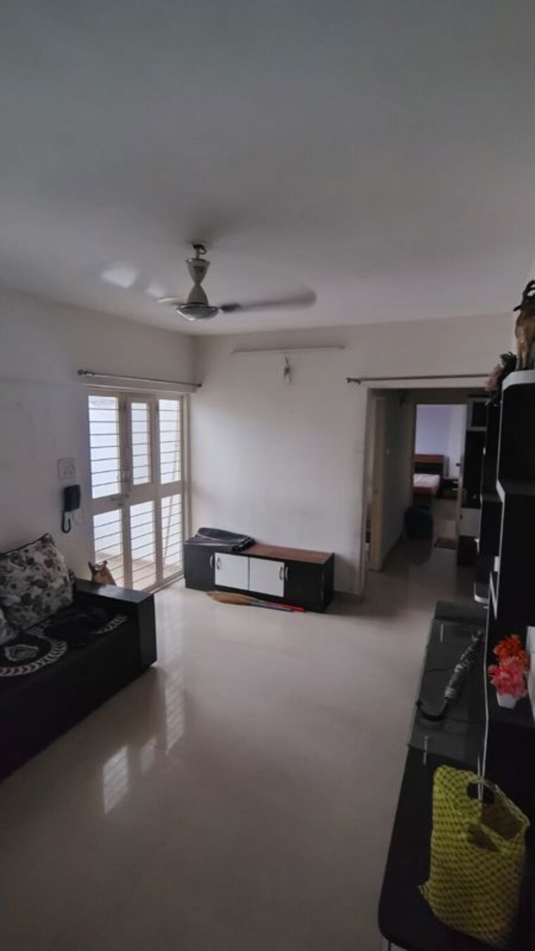 Living Room, green-county-phase-ii 2 Bedroom 850 Sq.Ft. Apartment In Fursungi Pune 10629710