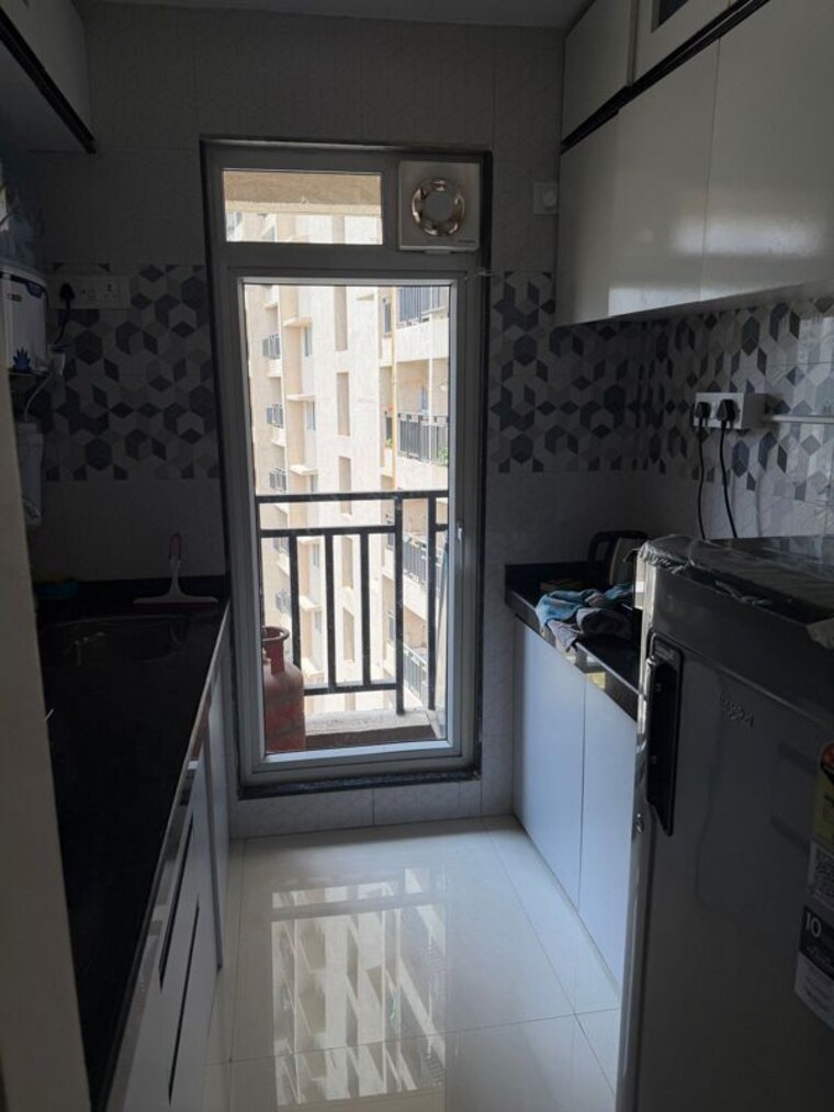 Kitchen, raunak-bliss 1 Bedroom 400 Sq.Ft. Apartment In Ghodbunder Road Thane 10629781