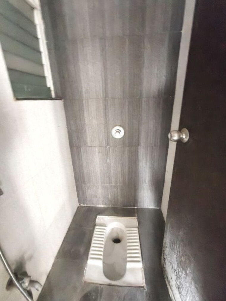 Washroom, mantra-senses 2 Bedroom 550 Sq.Ft. Apartment In Handewadi Pune 10629805