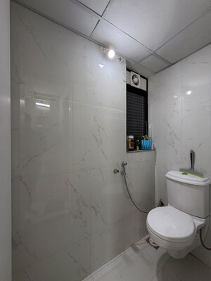 Bathroom in 1 BHK Apartment at Runwal Gardens, Dombivli East – for Rent