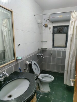 Bathroom in 2 BHK Apartment at Harshvardhan CHS Powai, Powai – for Rent