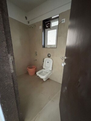 Bathroom in 2 BHK Apartment at Puranik City Reserva, Ghodbunder Road – for Rent
