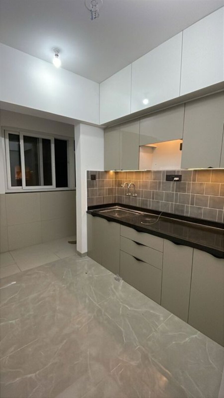 Kitchen, pristine-allure 2 Bedroom 780 Sq.Ft. Apartment In Kharadi Pune 10629806