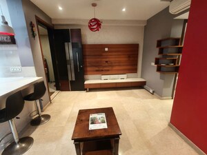Living Room in 2 BHK Apartment at One Hiranandani Park Fairway, Ghodbunder Road – for Rent