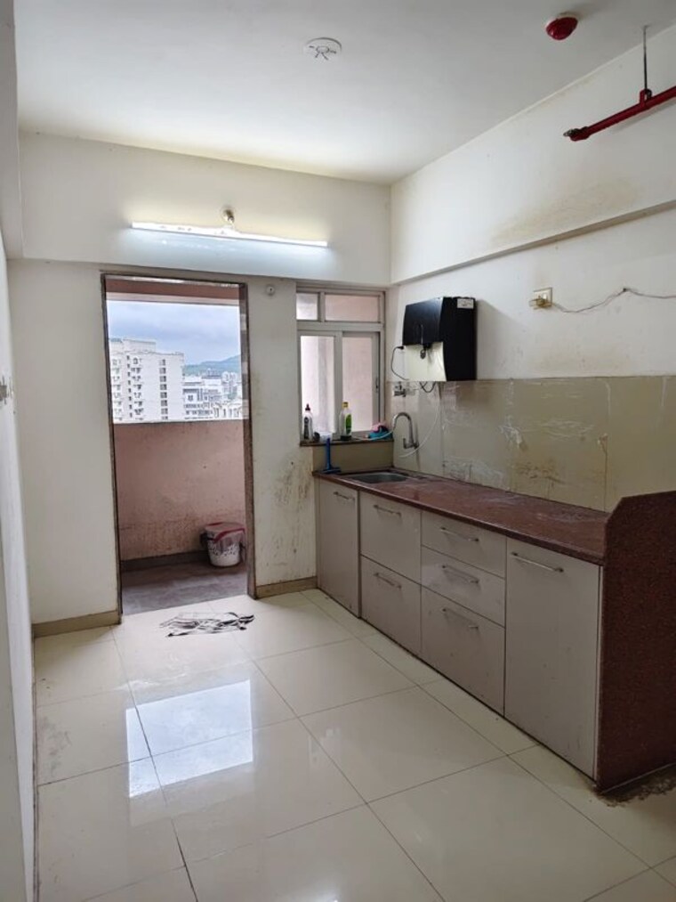 Kitchen, puranik-aldea-annexo 2 Bedroom 850 Sq.Ft. Apartment In Baner Pune 10629919