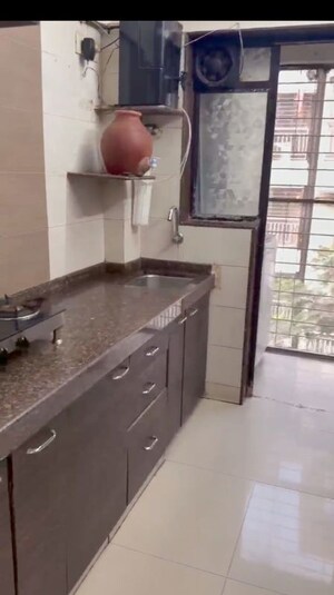 Kitchen in 1 BHK Apartment at Aakruti Elegance, Mira Road – for Sale