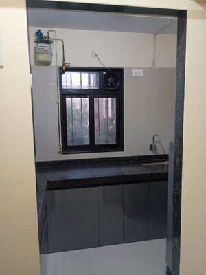 Kitchen in 1 BHK Apartment at Dosti Desire Joy, Brahmand – for Rent