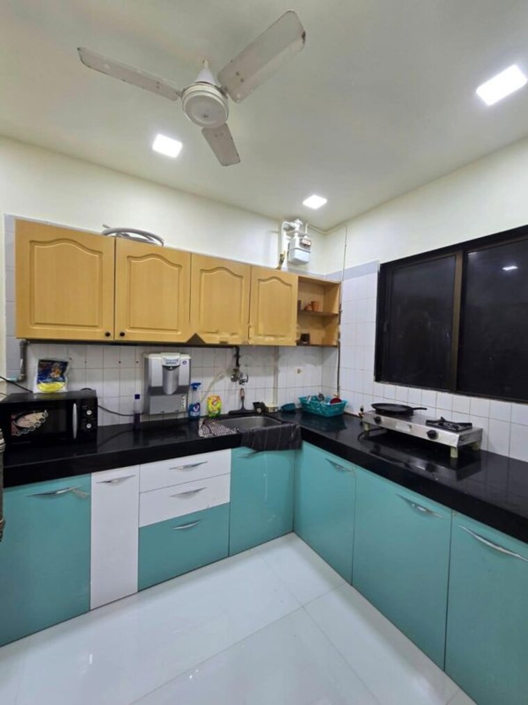 Kitchen, uk-iridium 2 Bedroom 800 Sq.Ft. Apartment In Kandivali East Mumbai 10629966