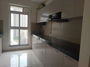 Kitchen in 3 BHK Apartment at Godrej Emerald, Ghodbunder Road – for Rent
