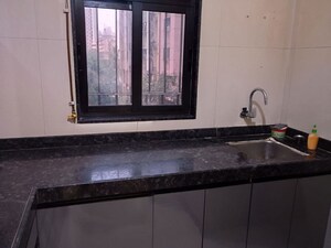 Kitchen in 1 BHK Apartment at Dosti Desire Joy, Brahmand – for Rent