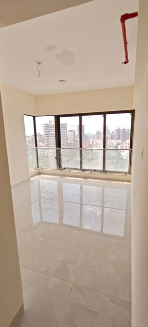Room in 2 BHK Apartment at IM Applaud 38, Goregaon East – for Rent