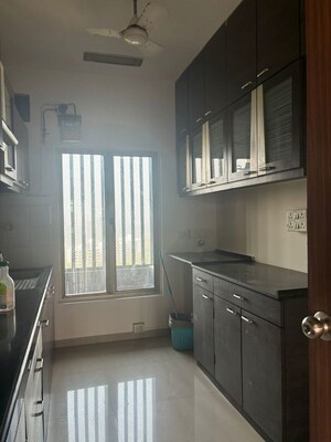 Kitchen in 2.5 BHK Apartment at Oberoi Realty Woods, Goregaon East – for Rent