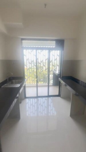 Kitchen in 2 BHK Apartment at Lodha Woods, Kandivali East – for Rent