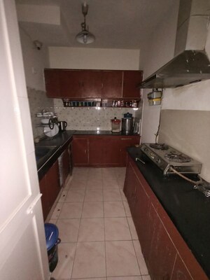 Kitchen in 2 BHK Apartment at Arun Vihar Sector 37, Sector 37 – for Rent