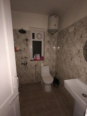 Bathroom in 2 BHK Apartment at Arun Vihar Sector 37, Sector 37 – for Rent