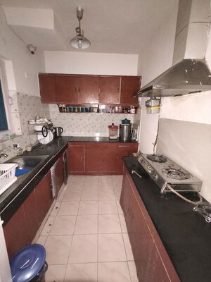 Kitchen in 2 BHK Apartment at Arun Vihar Sector 37, Sector 37 – for Rent