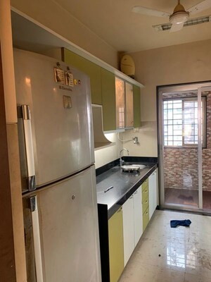 Kitchen in 2.5 BHK Apartment at Raheja Tipco Heights, Malad East – for Rent