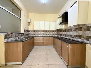 Kitchen in 3 BHK Apartment at Sushma Crescent, Dhakoli – for Rent